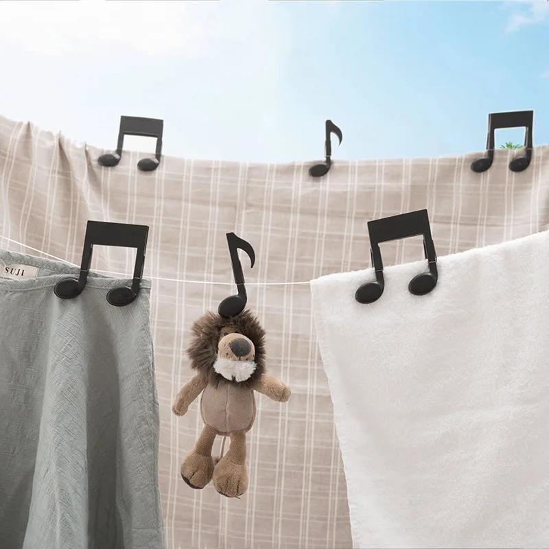 2개입 음표 모양 빨래집게 검정 스프링 클립 창의적인  - Baby Clothing Drying Rack 리뷰 및 가격